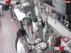 Pervert waitress puts hot dog in her wet cunt before serving it
